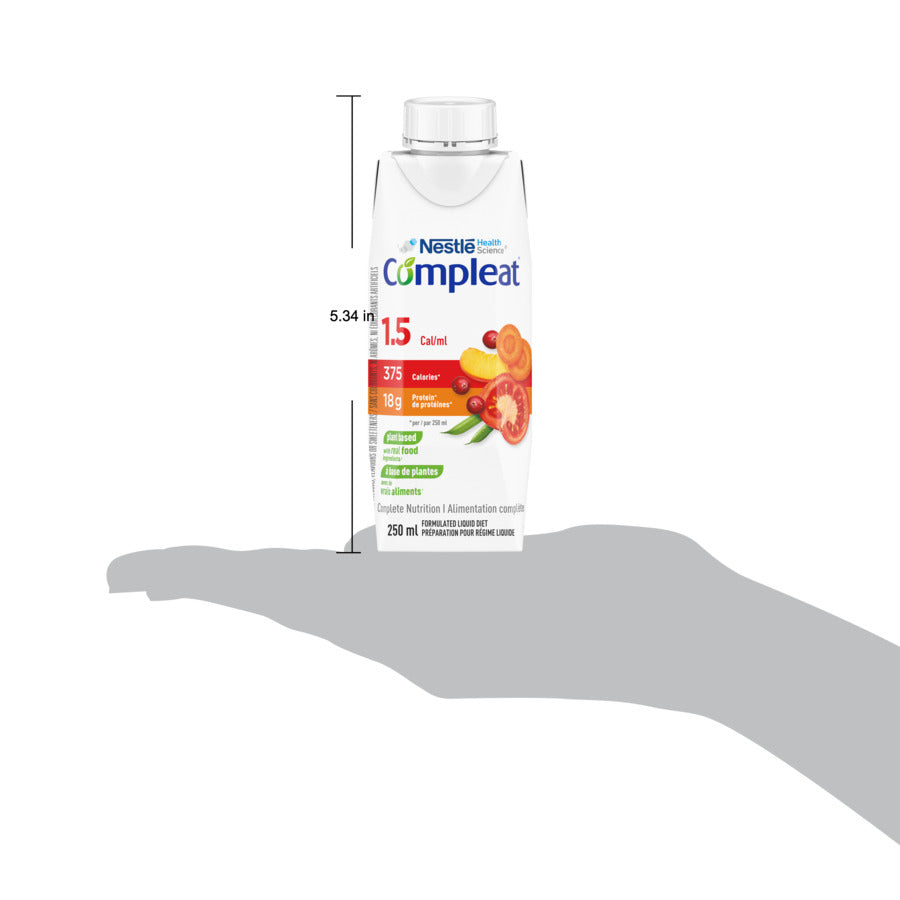 Compleat 1.5 Complete Nutrition 250 ml  displayed on a hand